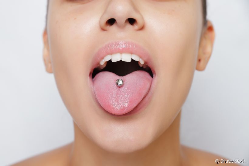 Dentista lista principais danos que piercing oral pode causar