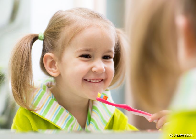 É possível que alguns dentes já nasçam cariados?