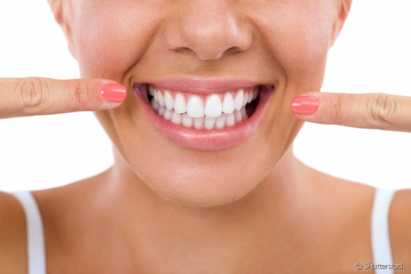 O que causa dor de dente ao usar a moldeira com gel clareador?